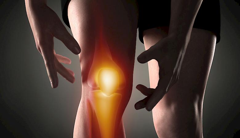 Foto mit einem illustrierten Knie das Schmerzt